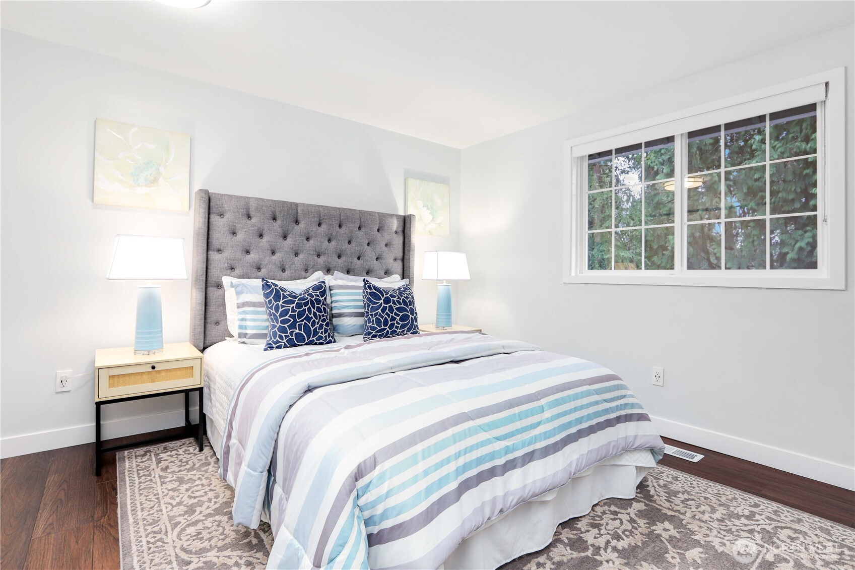 1822 171st Place Southeast Bothell, WA 98012 - Photo 9 of 36 a bedroom with a bed and a window