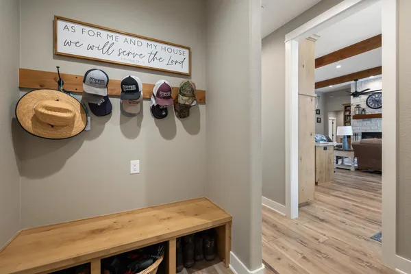 a view of storage and utility room with two washing machine
