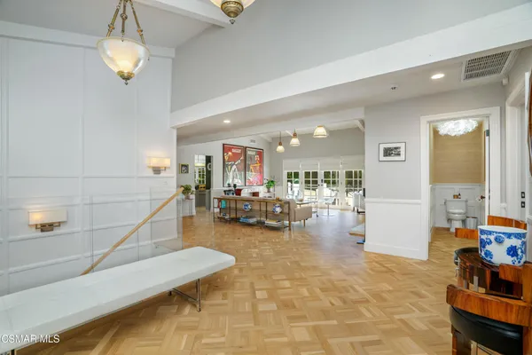 a view of dining room with furniture and a window