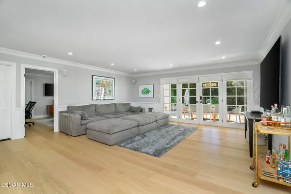 a living room with furniture and a couch