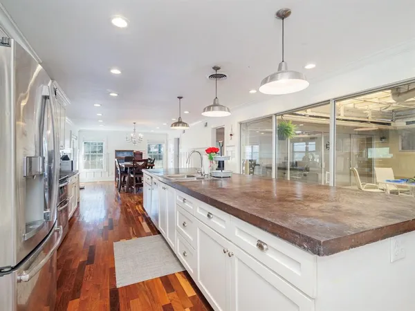 a view of a kitchen and living room