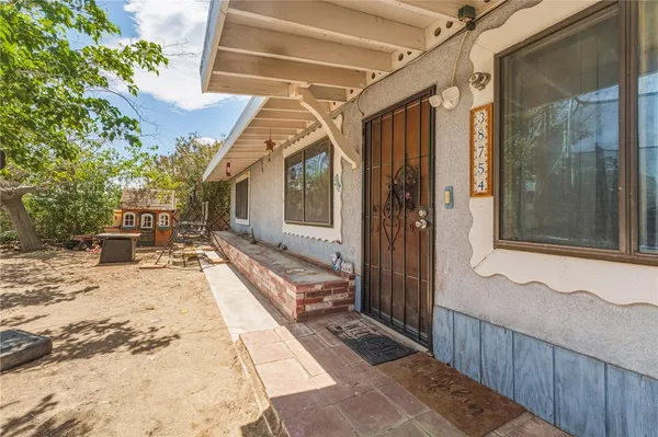 a view of a house with a porch