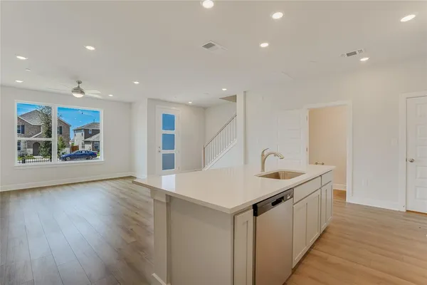 a bathroom with a shower and a shower head