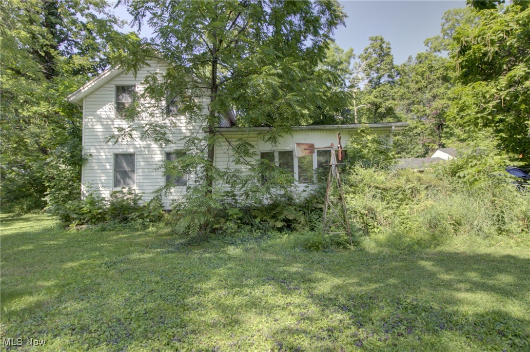 3227 Derussey Road Collins, OH 44826 - Photo 1 of 28 View of front facade with a front yard