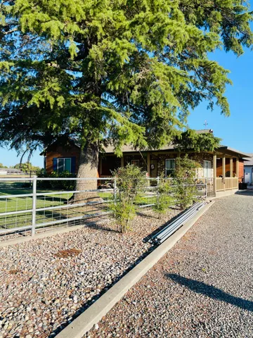 a bedroom with bed and window