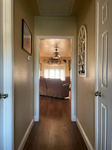 a living room with furniture a patio and a fireplace
