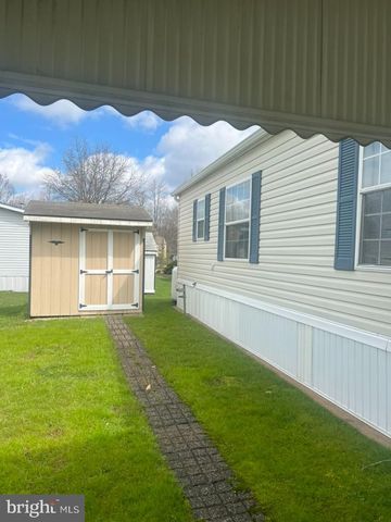a view of a house with a garden