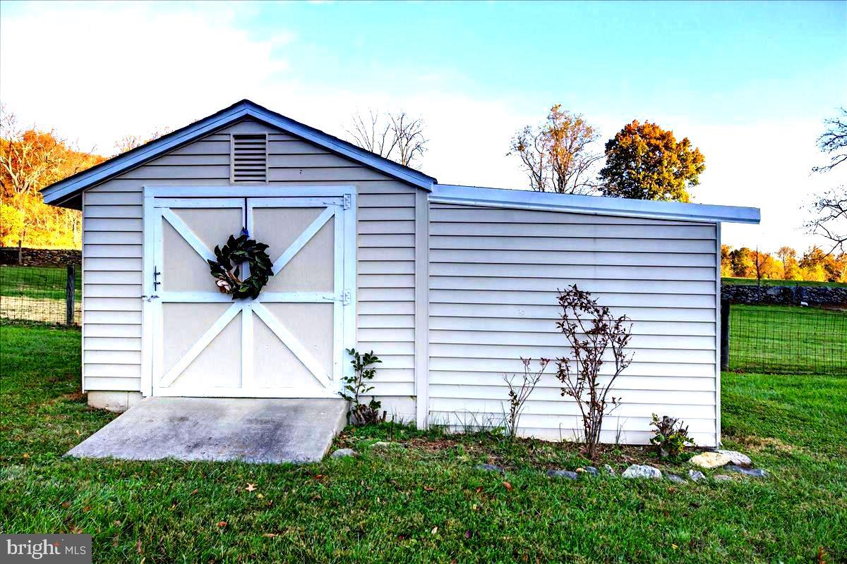 290 Riley Hollow Road Huntly, VA 22640 - Photo 121 of 148 a front view of a house with a yard and garage
