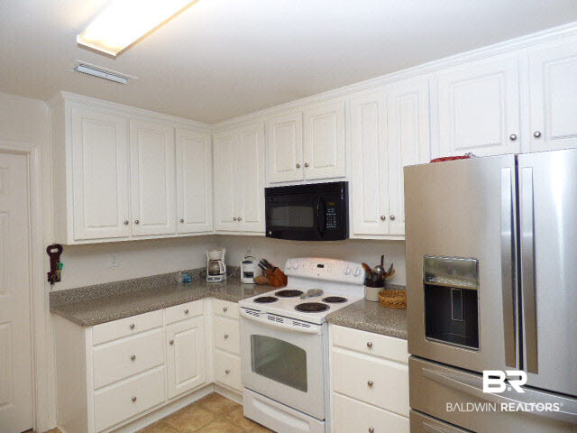 7453 Fairmont Drive Foley, AL 36535 - Photo 12 of 25 kitchen 3