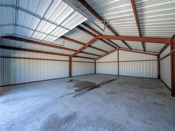 a swimming pool with outdoor seating and yard