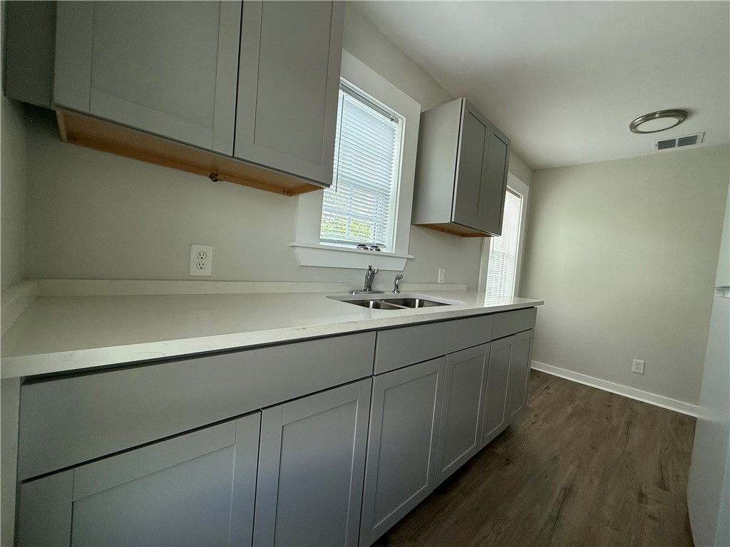 210 O'Neal Avenue, Unit A Sinton, TX 78387 - Photo 8 of 15 a bathroom with a sink and a mirror