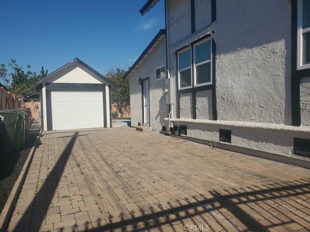 125 East Alondra Boulevard Compton, CA 90220 - Photo 3 of 24 a view of an house with backyard and garden
