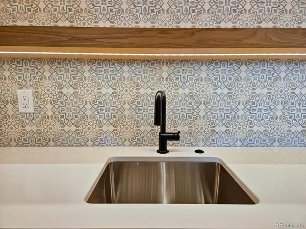 a bathroom with a sink and a bathtub