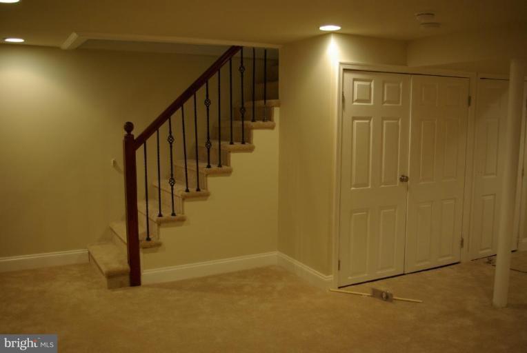 4676 Marble Hall Road Baltimore, MD 21239 - Photo 14 of 20 a view of hallway with stairs