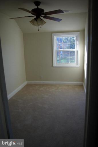 4676 Marble Hall Road Baltimore, MD 21239 - Photo 20 of 20 an empty room with a window