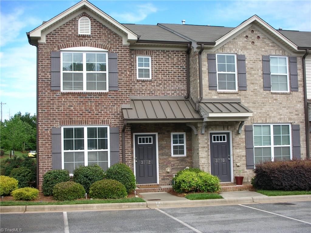 3772 Shadow Ridge Drive High Point, NC 27265 - Photo 1 of 27 Front view of home with landscaping and parking area.