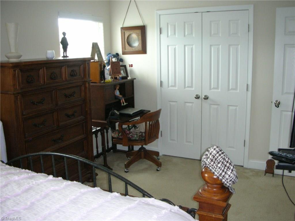 3772 Shadow Ridge Drive High Point, NC 27265 - Photo 19 of 27 View of the master bedroom from the other side of the room with the double door closet.