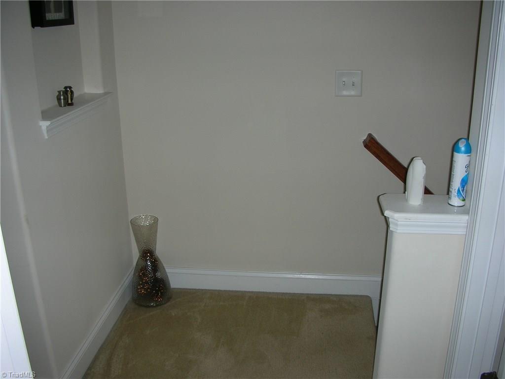 3772 Shadow Ridge Drive High Point, NC 27265 - Photo 25 of 27 Area at the top of the stairs is carpeted as are the stairs. You will also see a recessed area to the left which is a great place for a picture and some decorations.