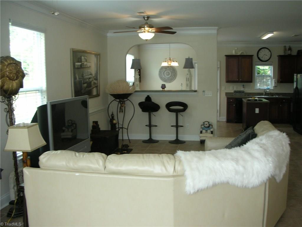 3772 Shadow Ridge Drive High Point, NC 27265 - Photo 4 of 27 View of living room looking toward the kitchen and breakfast area. Windows provide natural lighting.