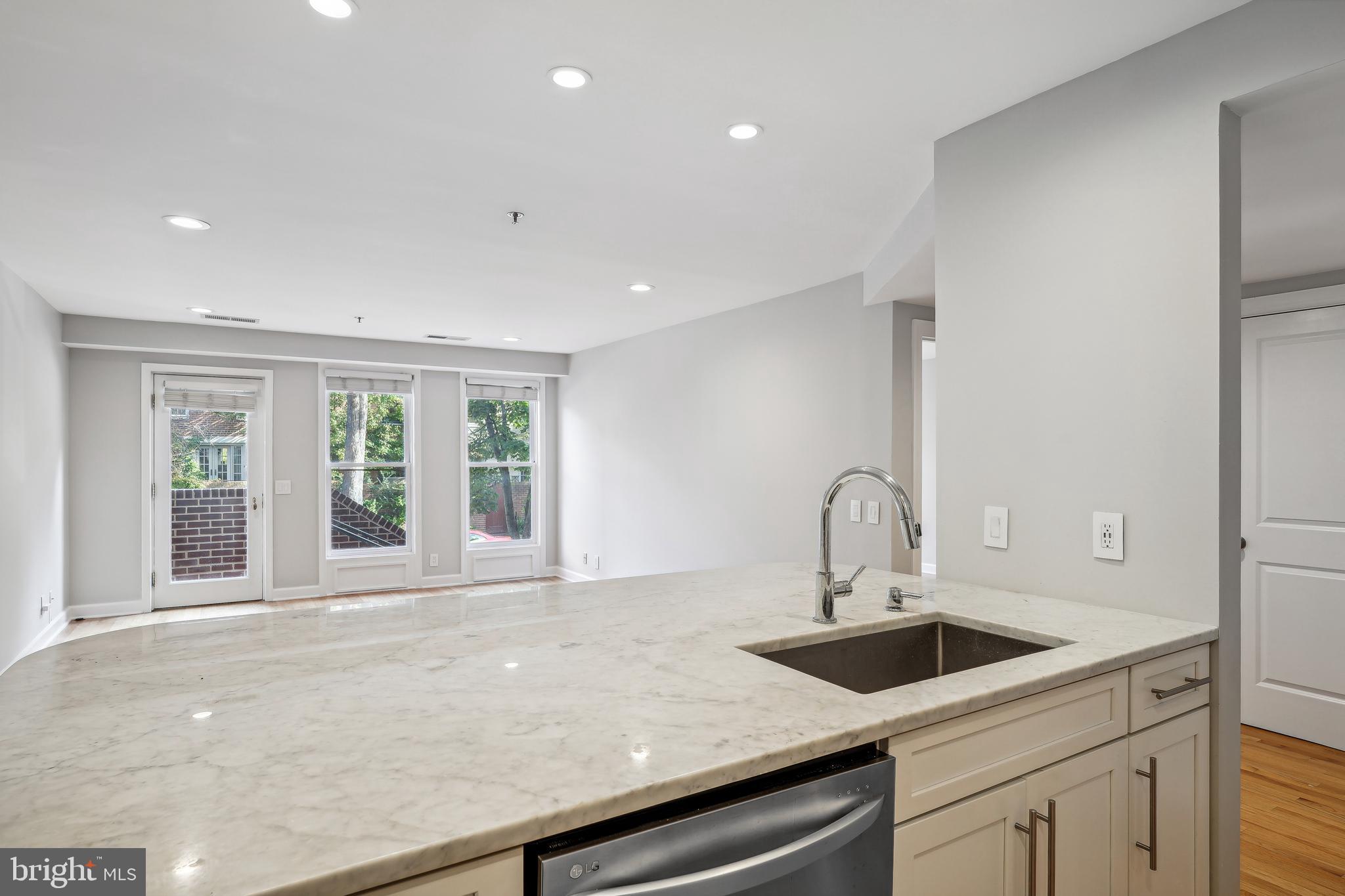 110 Cameron Street, Unit CS103 Alexandria, VA 22314 - Photo 9 of 16 Kitchen: quartz counter tops