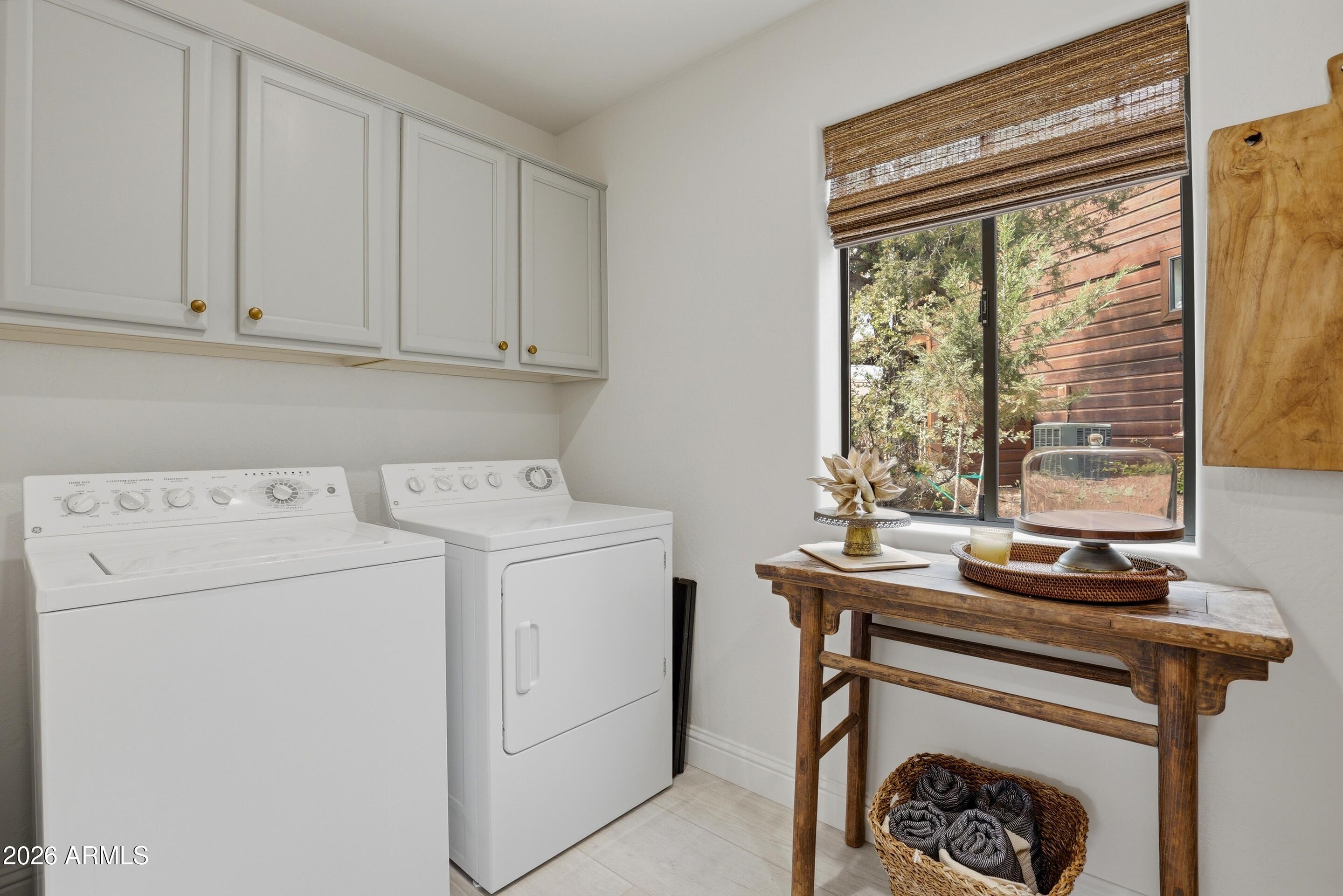 2502 East Elk Run Court Payson, AZ 85541 - Photo 12 of 27 a view of washer and dryer with kitchen view