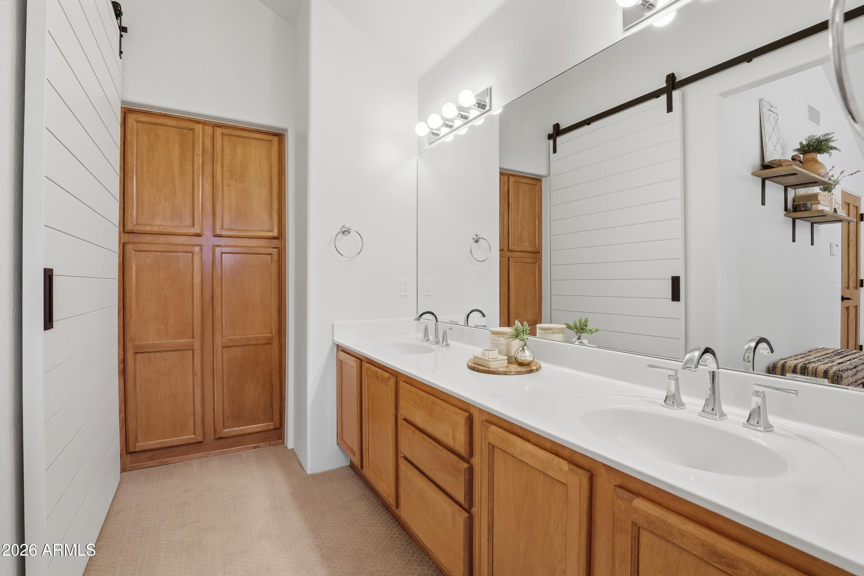 2502 East Elk Run Court Payson, AZ 85541 - Photo 15 of 27 a bathroom with a double vanity sink and mirror