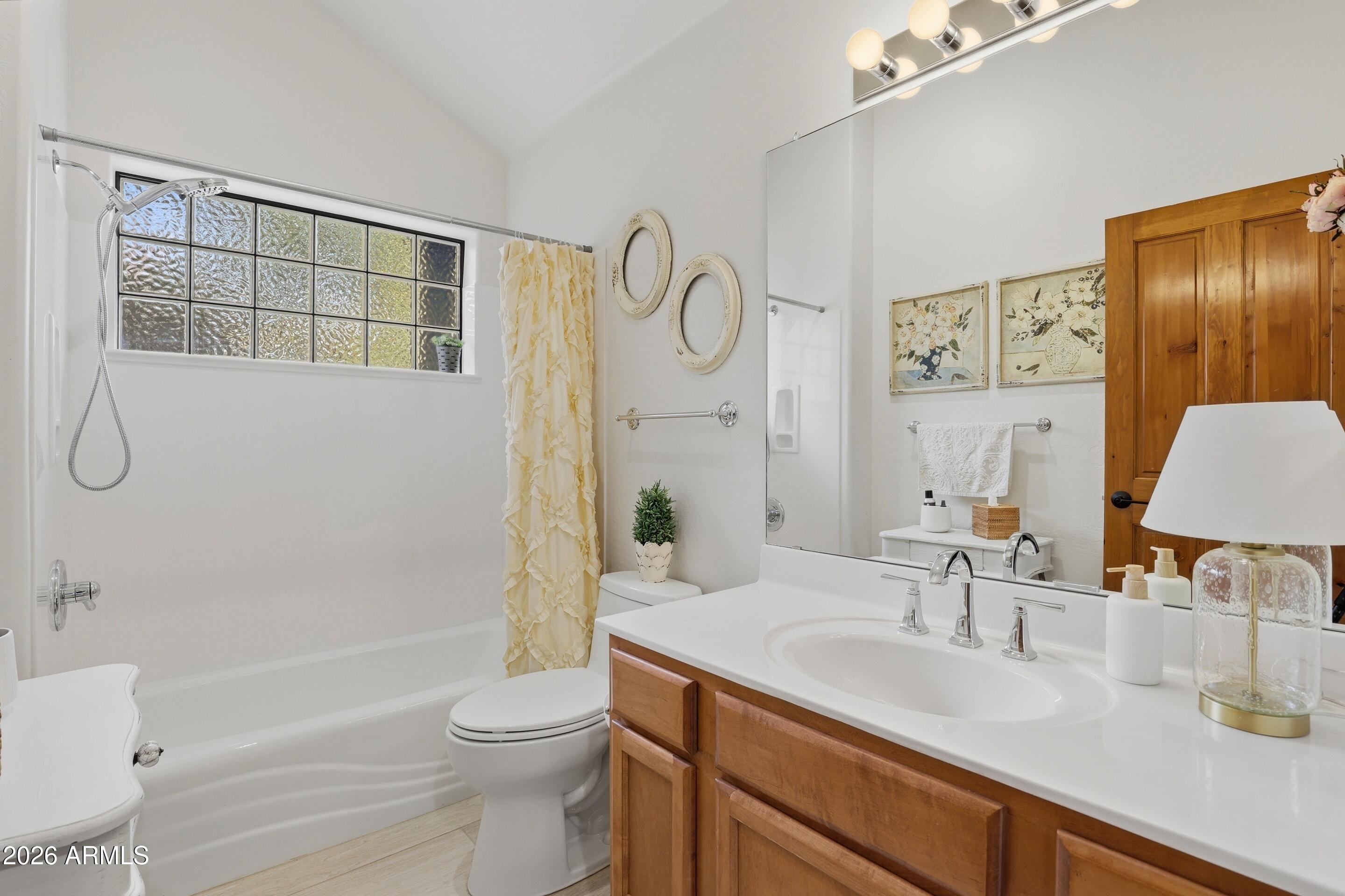 2502 East Elk Run Court Payson, AZ 85541 - Photo 18 of 27 a bathroom with a sink toilet and shower