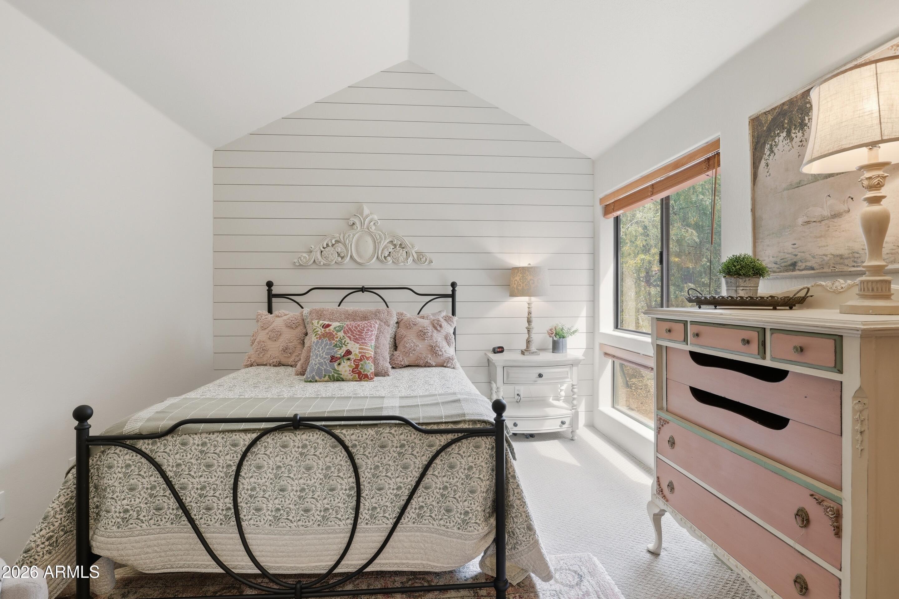 2502 East Elk Run Court Payson, AZ 85541 - Photo 19 of 27 a bedroom with a bed and a dresser