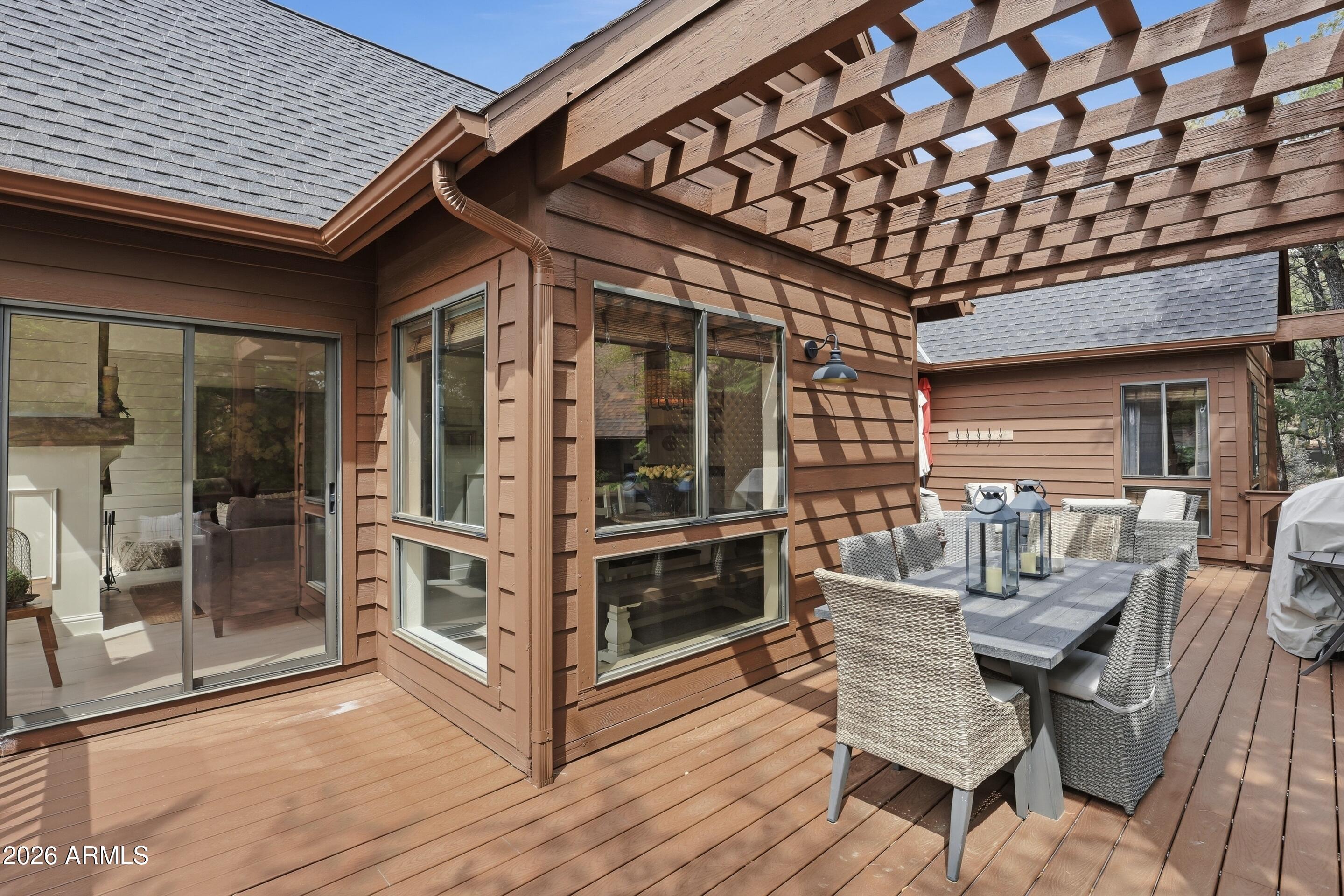 2502 East Elk Run Court Payson, AZ 85541 - Photo 23 of 27 a view of a chairs and table in a patio