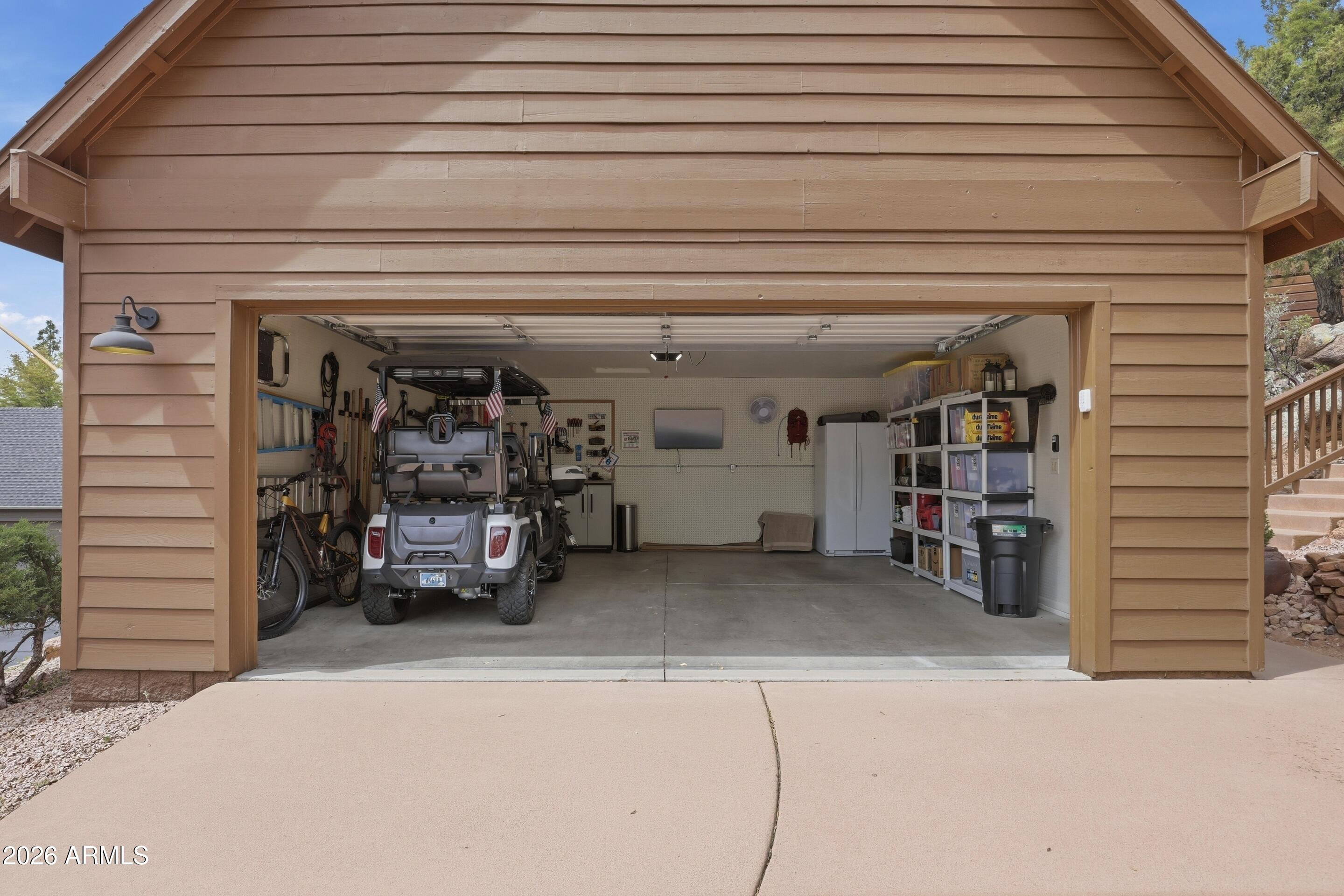 2502 East Elk Run Court Payson, AZ 85541 - Photo 25 of 27 a view of a garage with storage