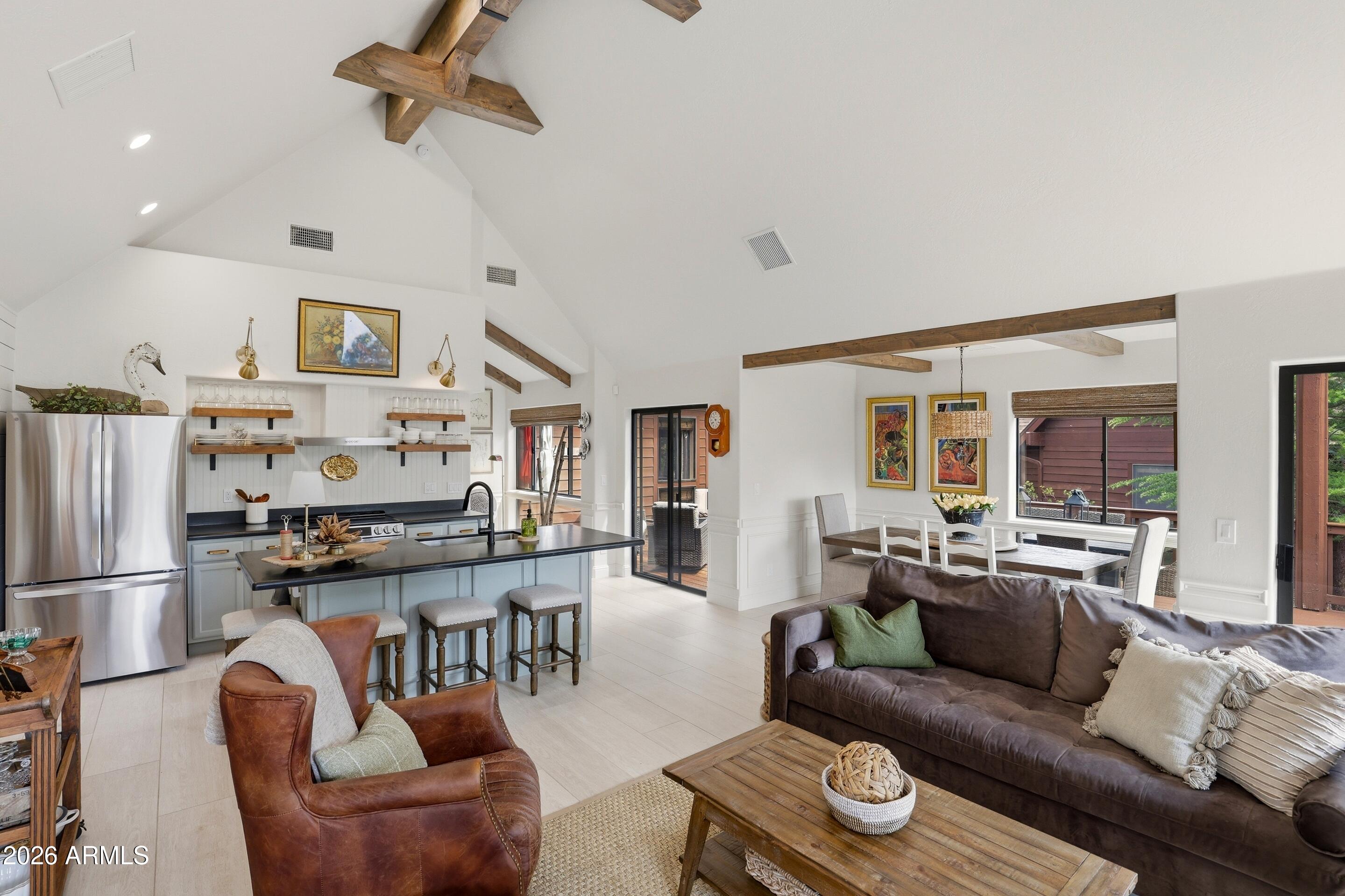 2502 East Elk Run Court Payson, AZ 85541 - Photo 6 of 27 a living room with furniture and a kitchen view