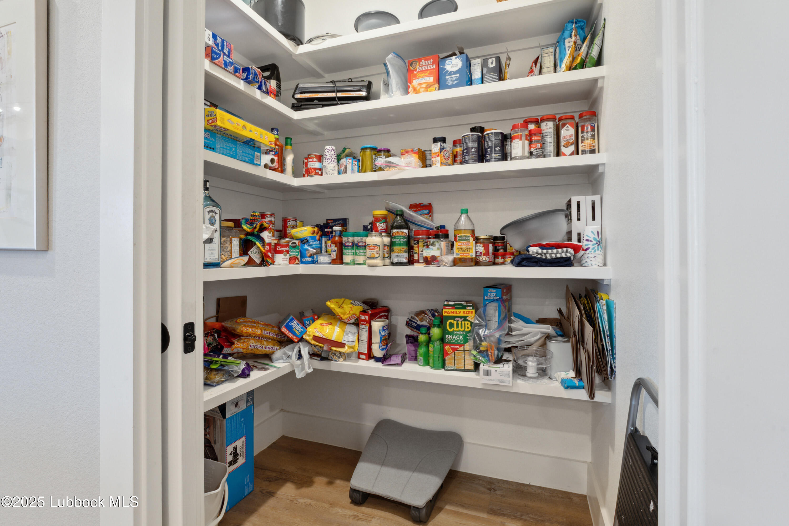 2915 137th Street Lubbock, TX 79423 - Photo 12 of 40 a room with toys and storage