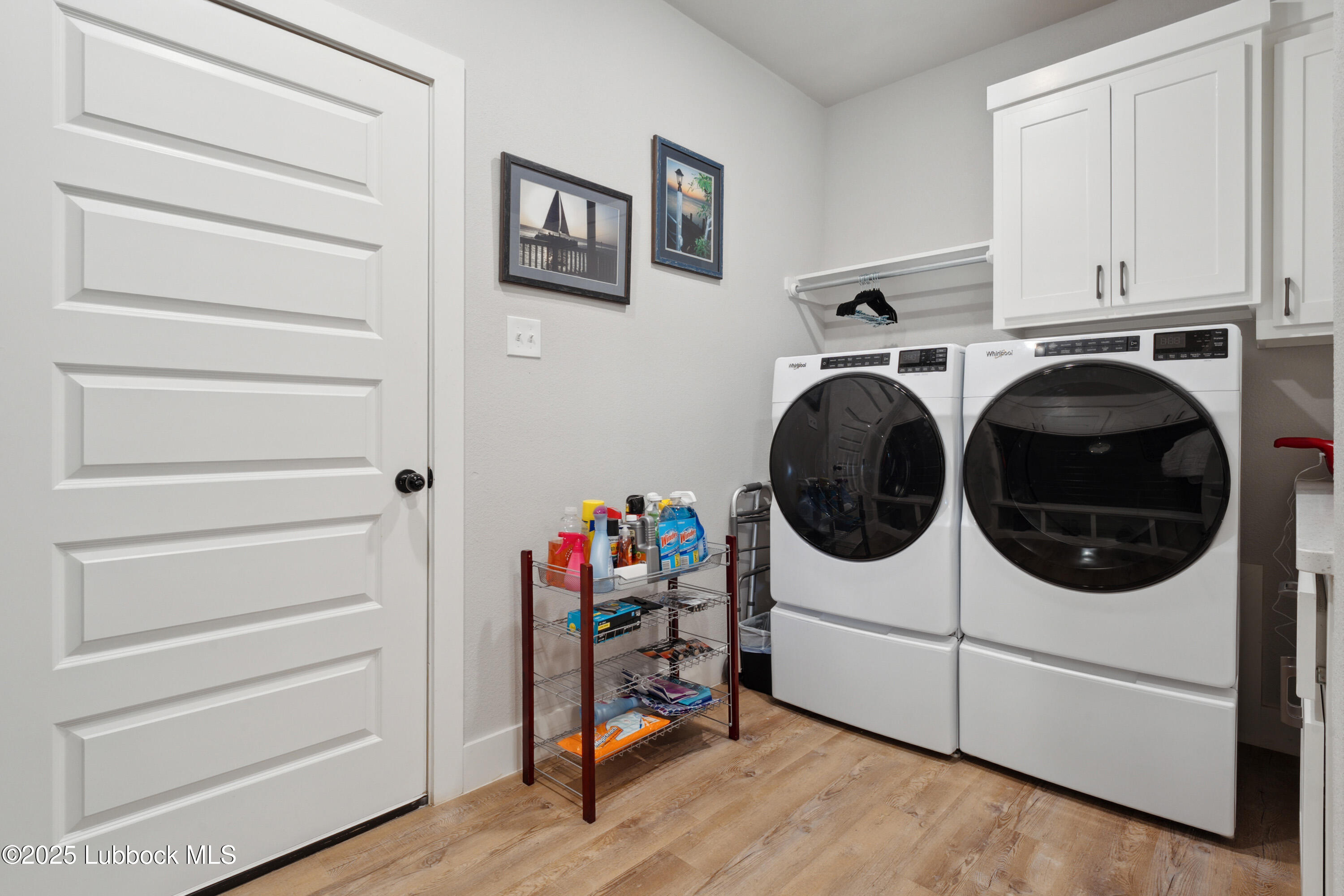 2915 137th Street Lubbock, TX 79423 - Photo 37 of 40 a utility room with dryer and washer