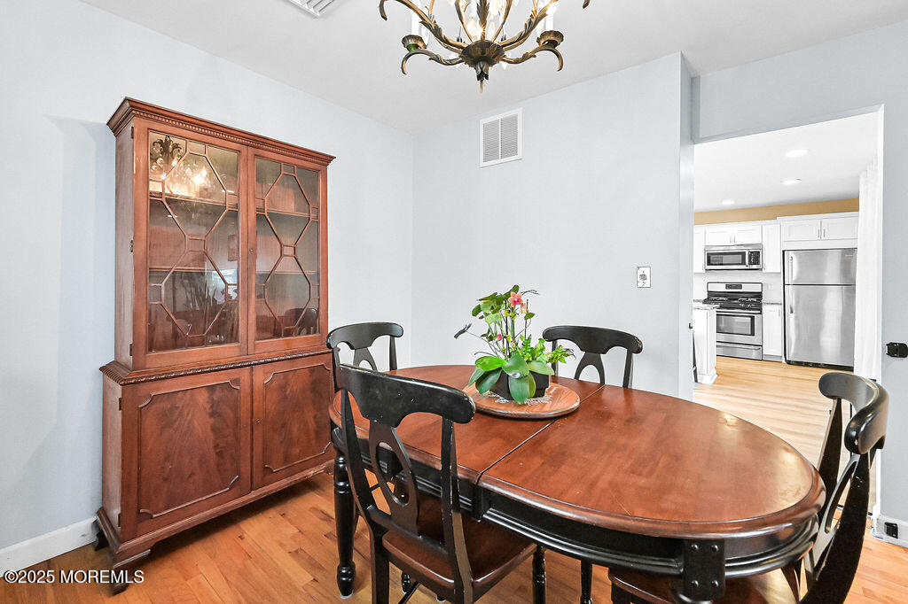9 Tralee Road Hazlet, NJ 07730 - Photo 12 of 40 a dining room with furniture and window