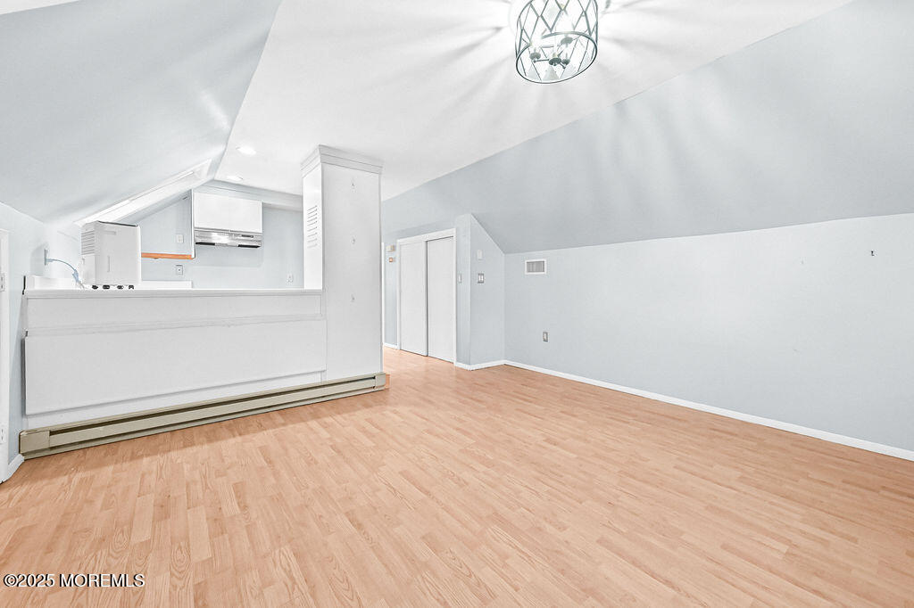 9 Tralee Road Hazlet, NJ 07730 - Photo 31 of 40 a view of empty room with wooden floor