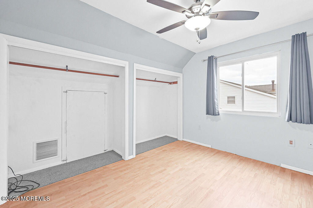 9 Tralee Road Hazlet, NJ 07730 - Photo 33 of 40 a view of an empty room with wooden floor and a window