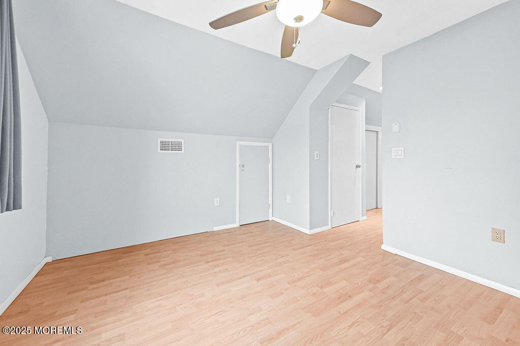 9 Tralee Road Hazlet, NJ 07730 - Photo 34 of 40 a view of empty room with a ceiling fan