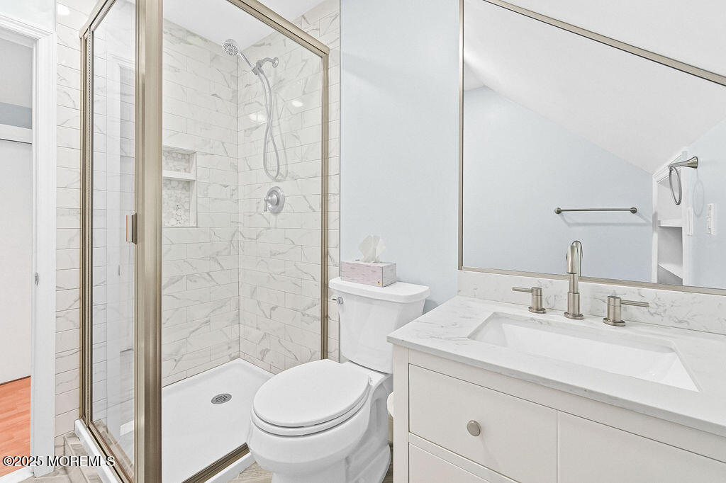 9 Tralee Road Hazlet, NJ 07730 - Photo 35 of 40 a bathroom with a sink toilet and shower