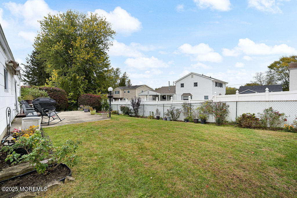 9 Tralee Road Hazlet, NJ 07730 - Photo 36 of 40 a view of a house with backyard and sitting area