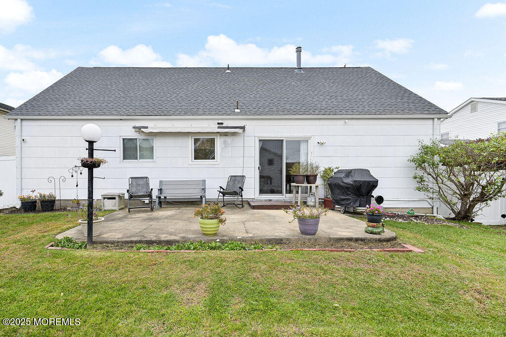 9 Tralee Road Hazlet, NJ 07730 - Photo 38 of 40 a view of a house with backyard porch and sitting area