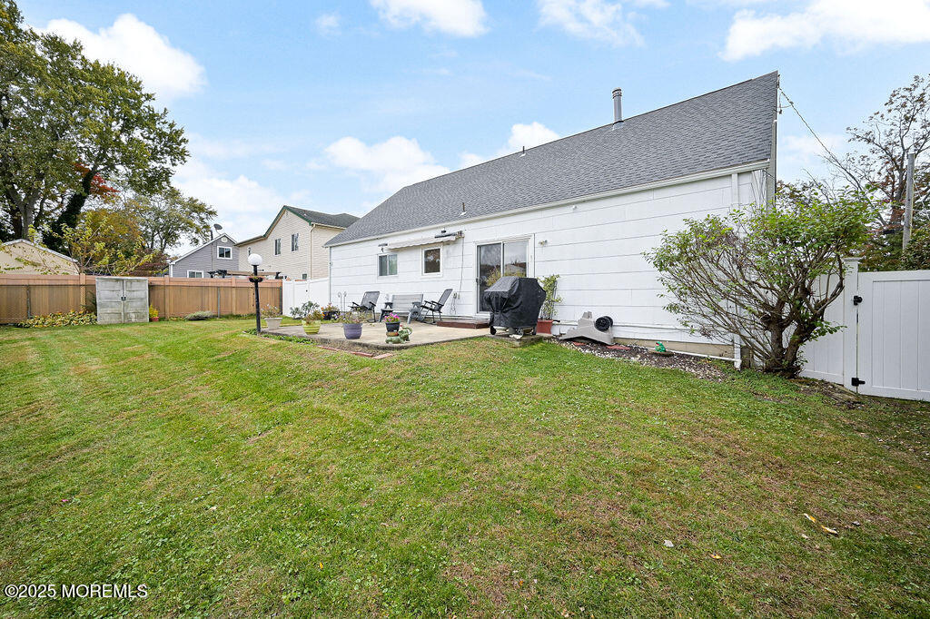 9 Tralee Road Hazlet, NJ 07730 - Photo 39 of 40 a view of a house with a back yard