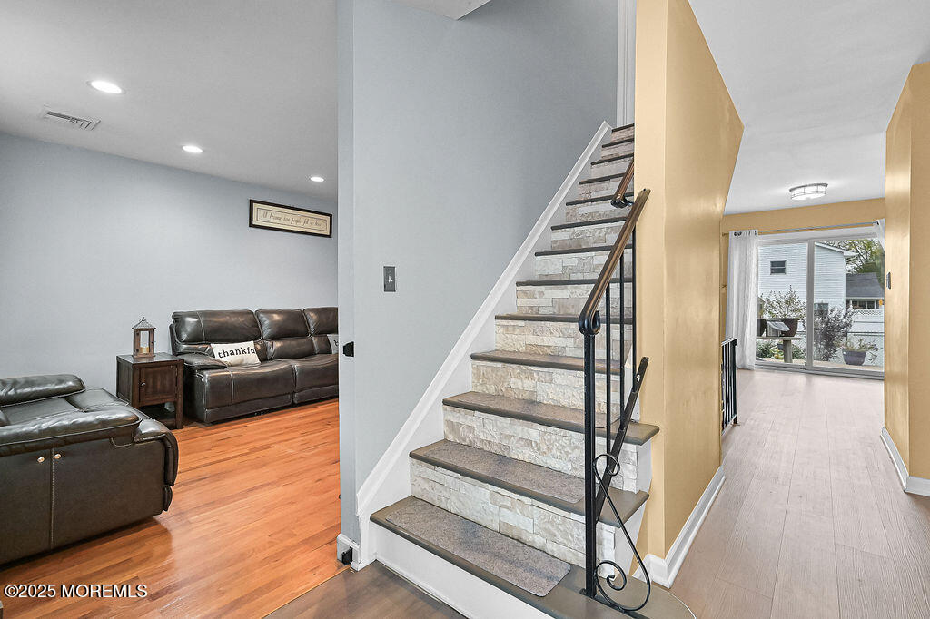 9 Tralee Road Hazlet, NJ 07730 - Photo 7 of 40 a living room with furniture and wooden floor