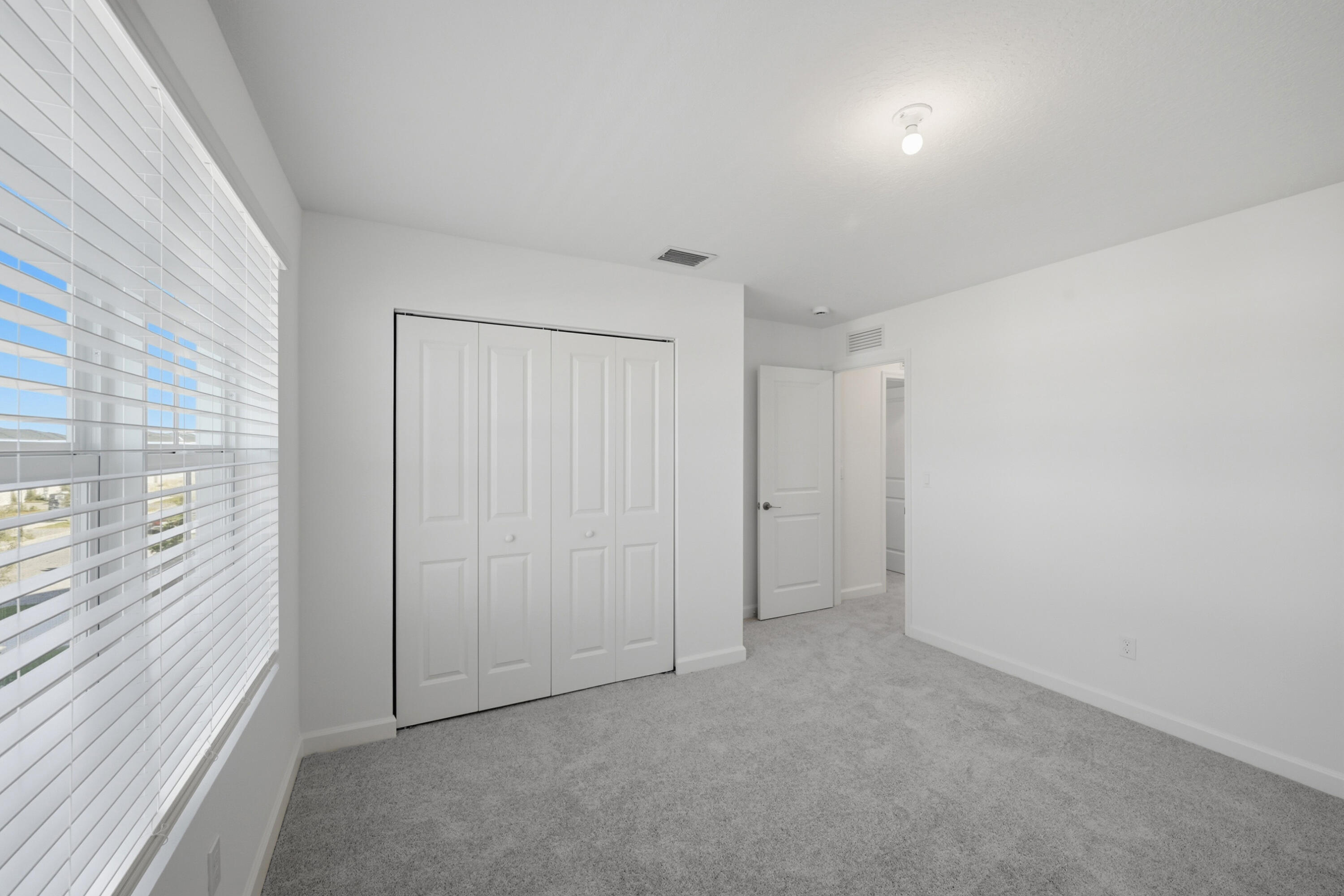 19568 Whispering Creek Road Loxahatchee, FL 33470 - Photo 21 of 30 a view of an empty room