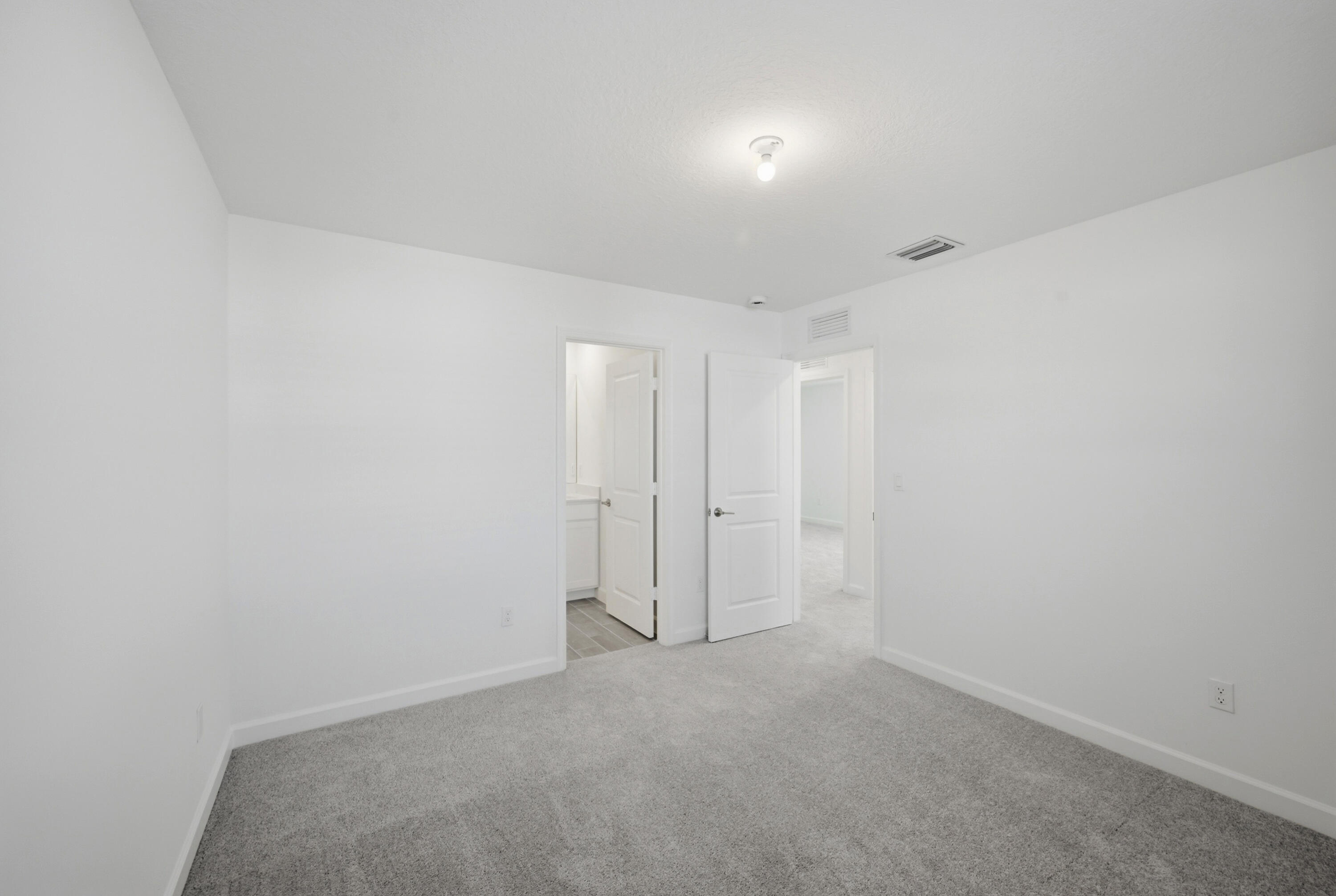 19568 Whispering Creek Road Loxahatchee, FL 33470 - Photo 26 of 30 a view of an empty room