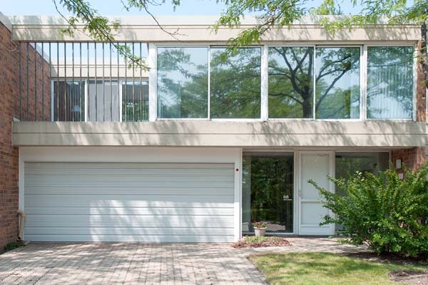 88 Avon Road, Unit 88 Northbrook, IL 60062 - Photo 1 of 17 a view of house with a swimming pool