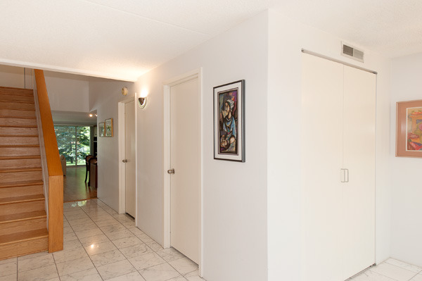 88 Avon Road, Unit 88 Northbrook, IL 60062 - Photo 3 of 17 a view of a hallway with closet