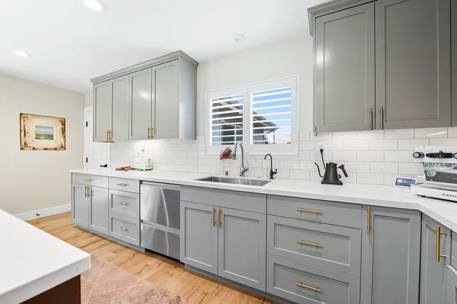 a bathroom with a double vanity sink mirror and double