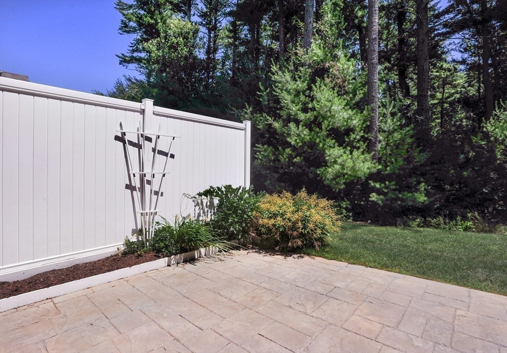 20 Mariner's Drive, Unit 20 Marshfield, MA 02050 - Photo 4 of 26 a view of a pathway with a yard