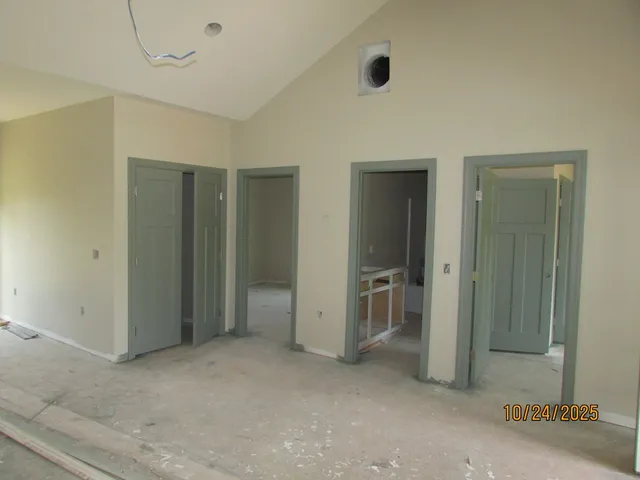 a view of an empty room and window