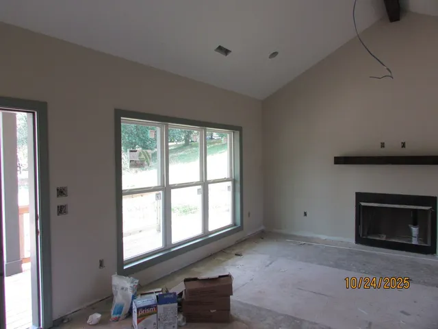 a living room with furniture and windows